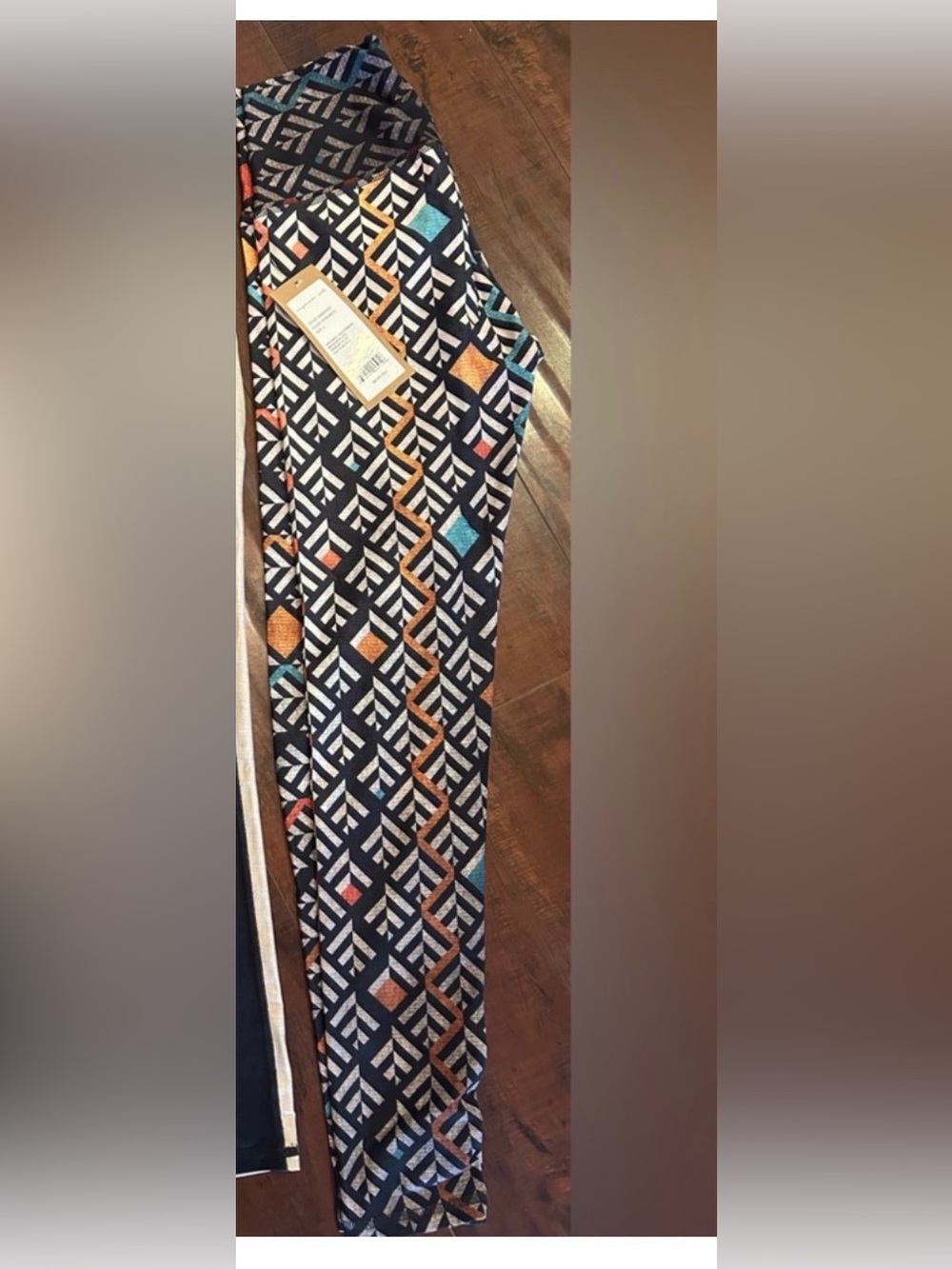 Niyama Sol Navy Geometric Print Leggings with Orange & Teal Accents
